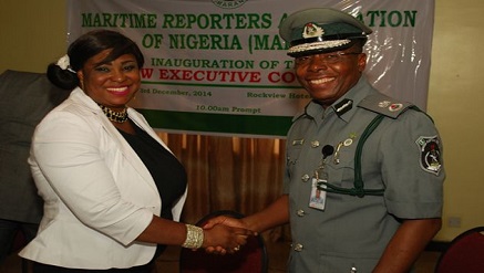 (L-r): Ify Obi, first female MARAN President in a warmth handshake with Mr. Nasir Anas Mohammed, Port Manager Lagos Port Complex, Apapa, representative of Alhaji Dikko Abdulahi, Comptroller General of Customs, during the inauguration of new MARAN excos.